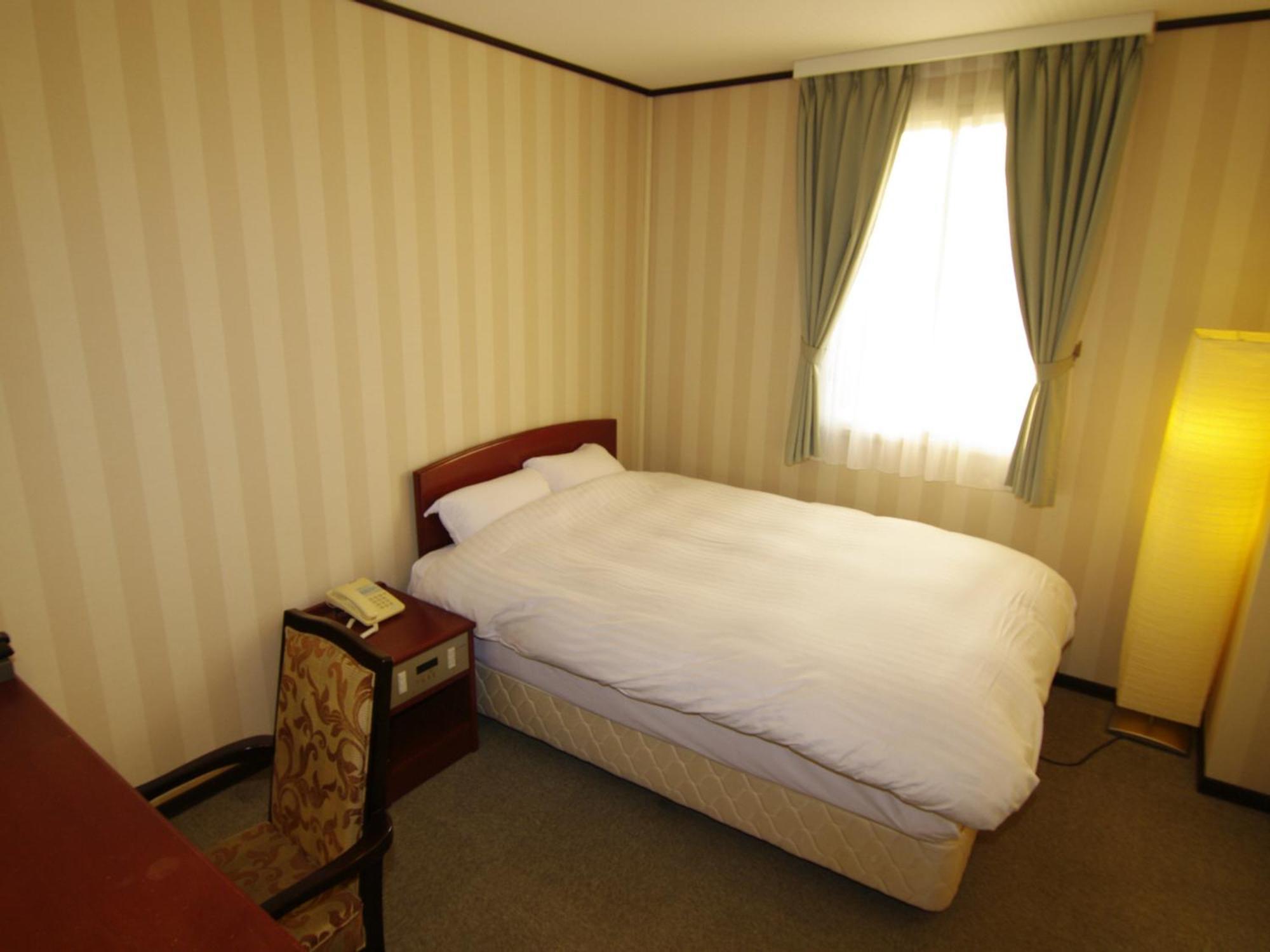 Tsukubanoyu Urban Hotel Pokoj fotografie