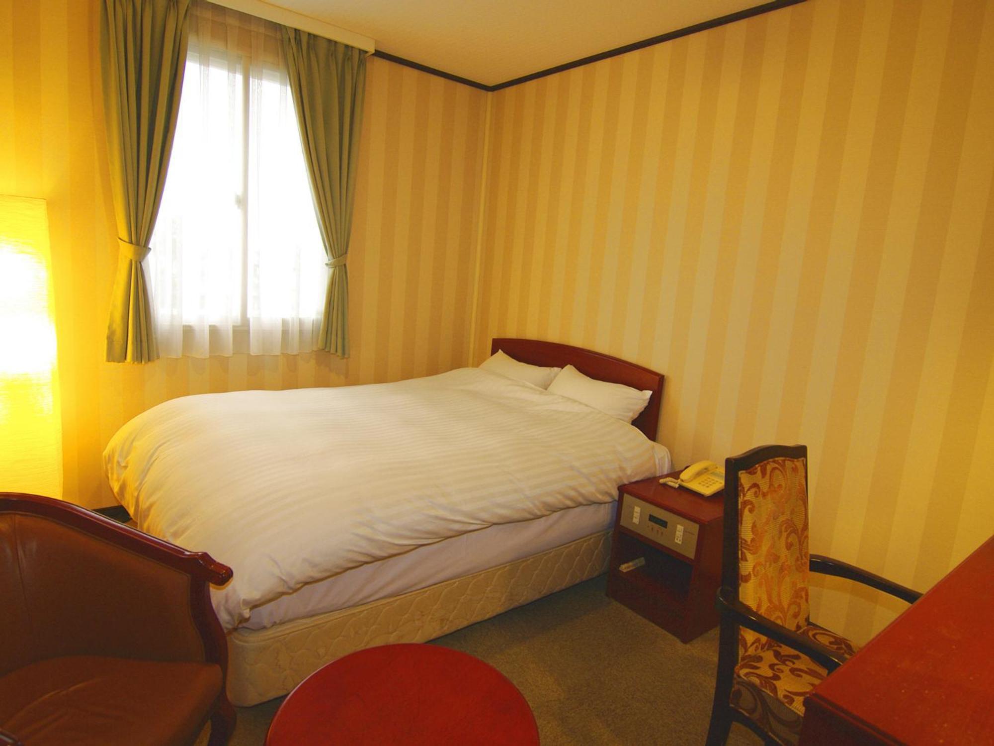 Tsukubanoyu Urban Hotel Pokoj fotografie